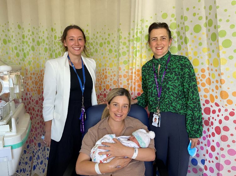 Taegen Burnside, registered midwife and clinical trials coordinator, and Dr Natasha Frawley with Brittany Santilla and her son Max.