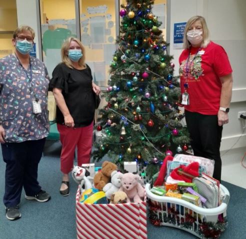 Paediatric ward staff members spread Christmas cheer with donation