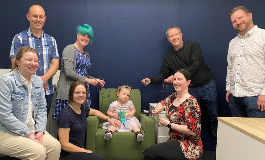 The Audiology team try out the new equipment with patient Molly and her mum, Grace