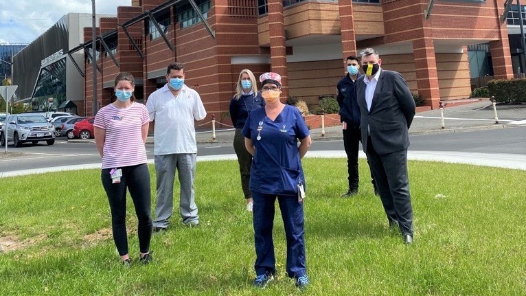 Left to right: Sally Eastwood (occupational therapist), Troy Harbour (catering), Lisa Todd (contact tracer), Deborah Whitcher (COVID ward nurse), Ali Raza (security guard), Dale Fraser (CEO)