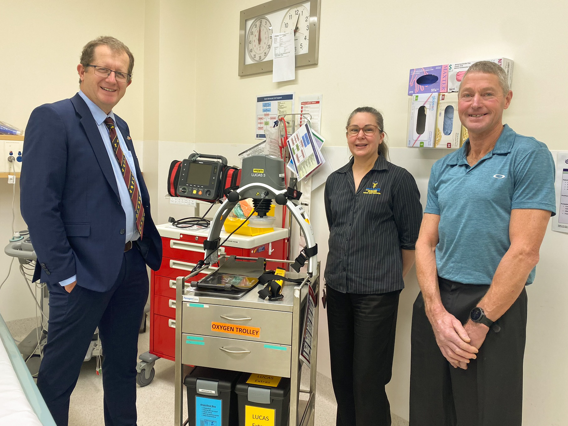 Matthew Hadfield, Chief Medical Officer, Grampians Health; Tania Harrison, Nurse Unit Manager Cardiovascular Unit Grampians Health Ballarat; David Fraser, former cardiology patient and winner of the Ballarat Marathon Mens 60+ division with one of the automatic CPR machines purchased through fundraising donations.