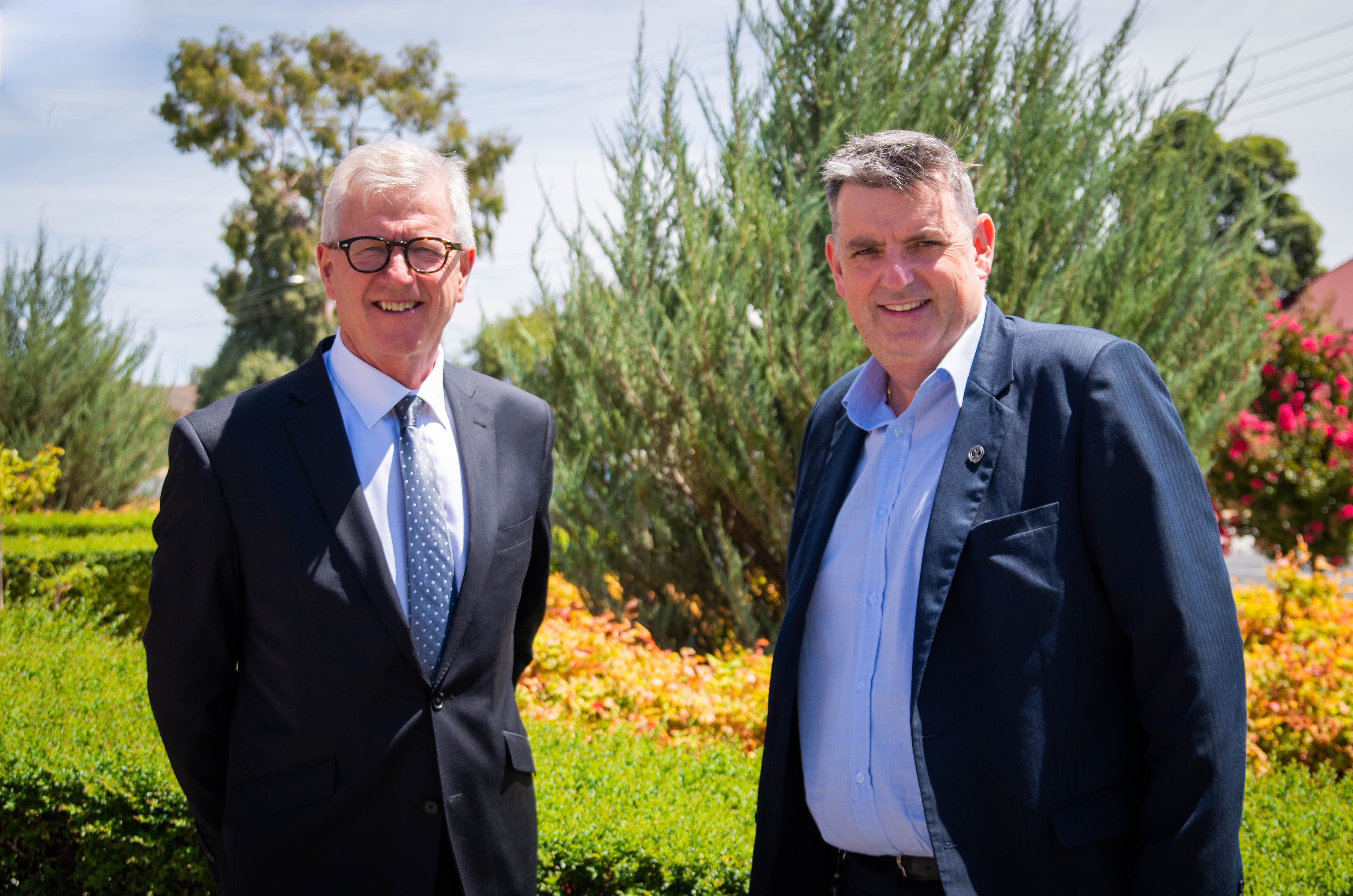 Board Chair Bill Brown congratulates Grampians Health CEO Dale Fraser on his appointment